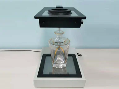 Piyé nggunak Polarimeter kanggo Ngikat Degreu Annealing In the Glass Container Bottom?